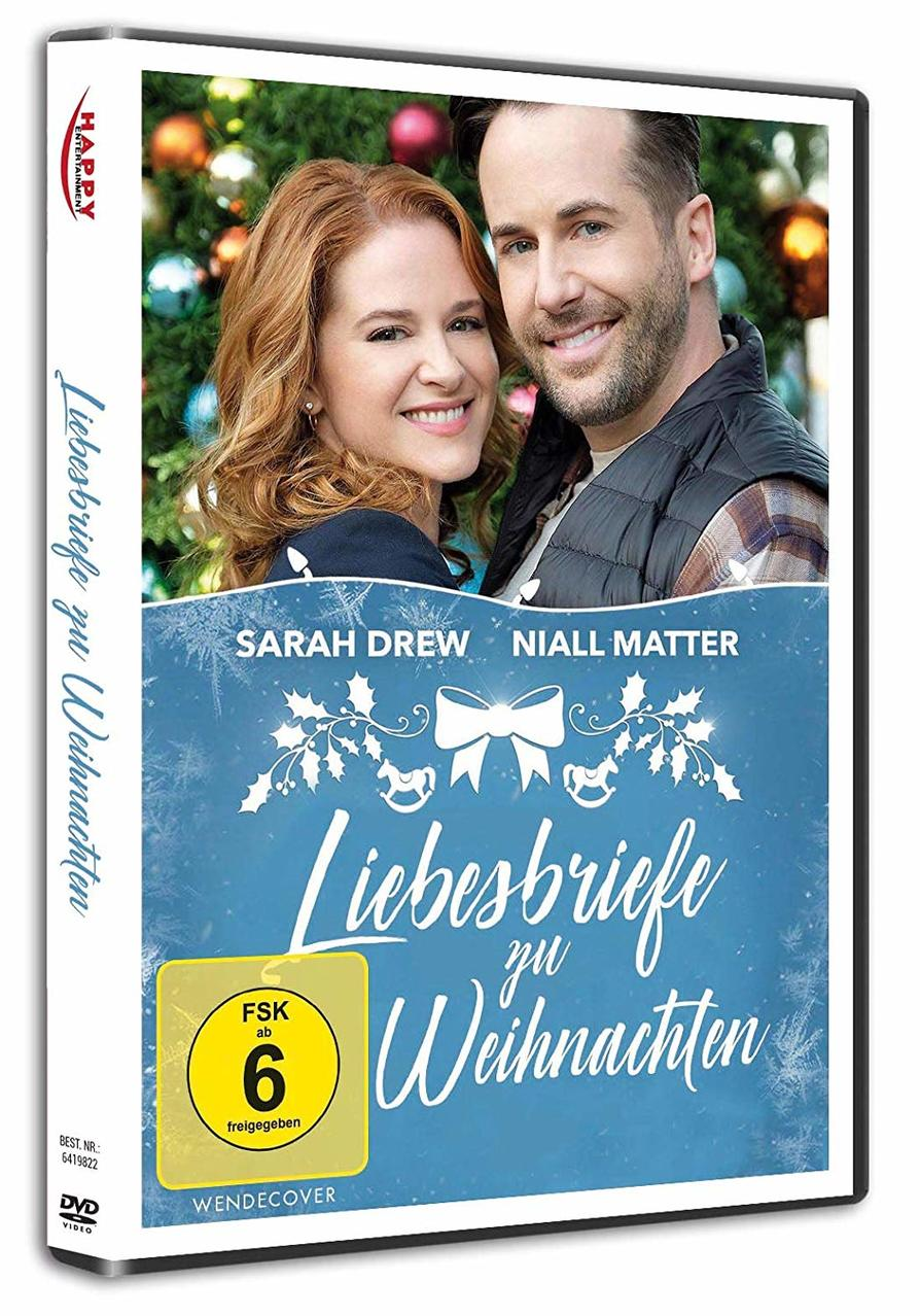 DVD-Cover: Frau und Mann lächeln, Weihnachtsbaum im Hintergrund, Titel: Liebesbriefe zu Weihnachten.