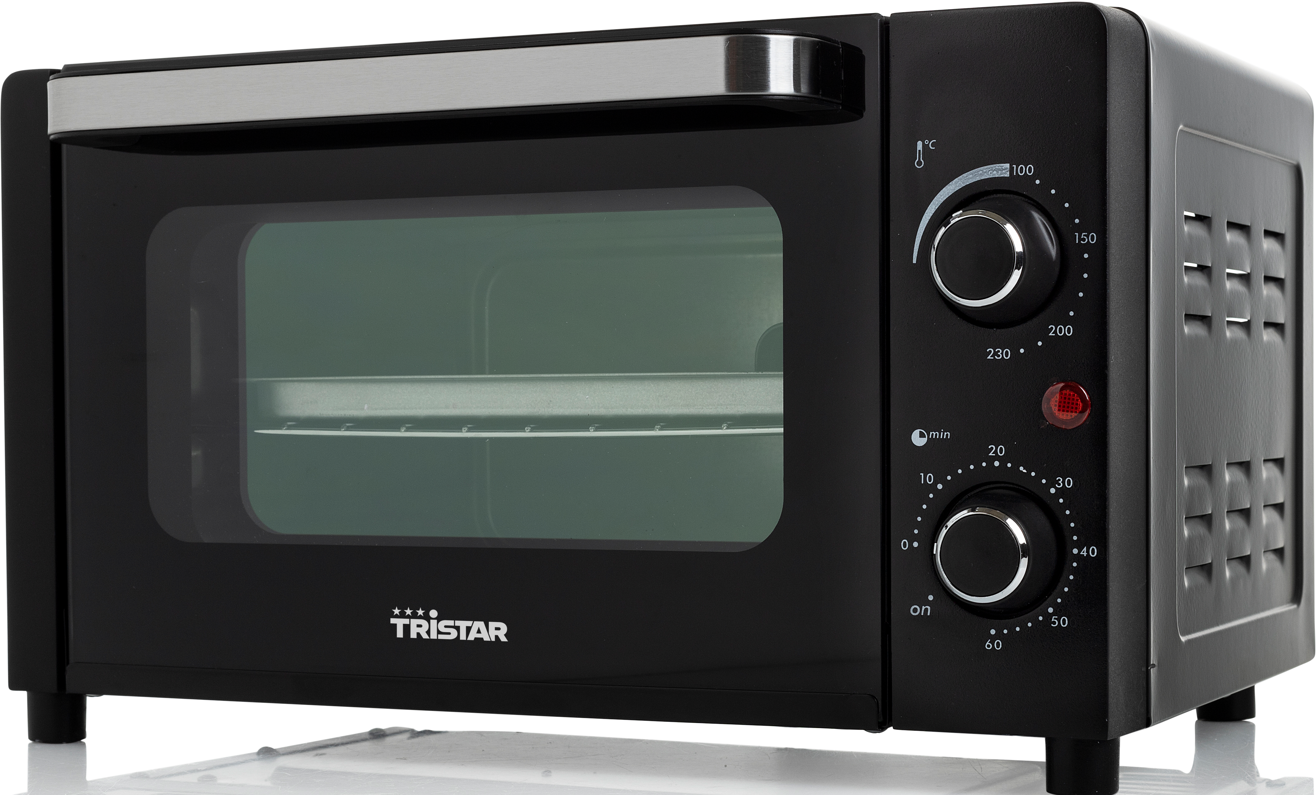 Schwarzer Minibackofen mit Bedienknöpfen, Glastür und silbernem Griff auf weißer Oberfläche.