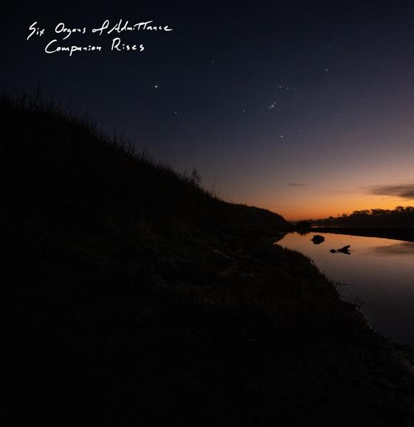 Albumhoes, een donker landschap met een rivier, en de tekst 'Six Organs of Admittance'.