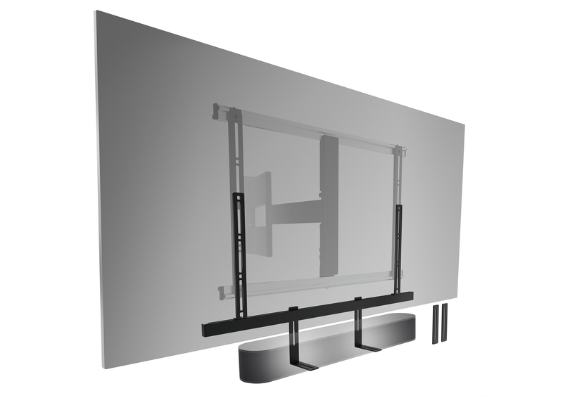 Een tv-beugel op een grijze muur. De montagebeugels voor de tv en soundbar zijn zichtbaar.