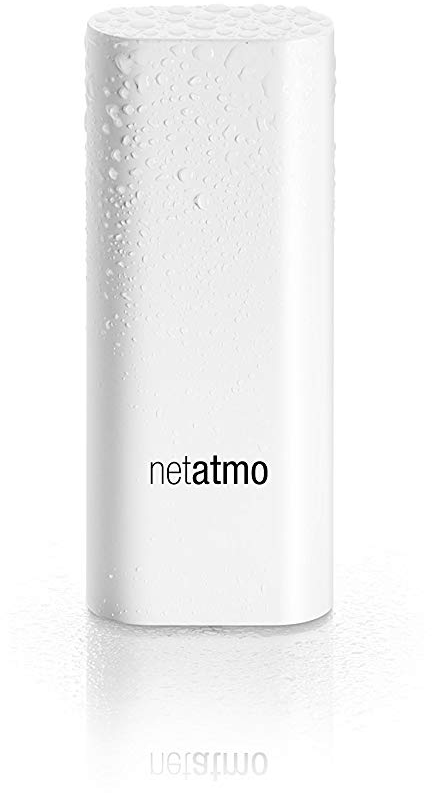 Stazione meteorologica Netatmo bianca. La parte superiore è bagnata. Il logo del marchio è al centro.