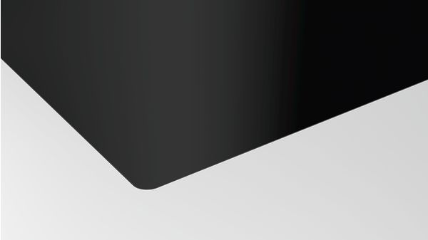 Black and white angled corner. A black surface meets a white surface.