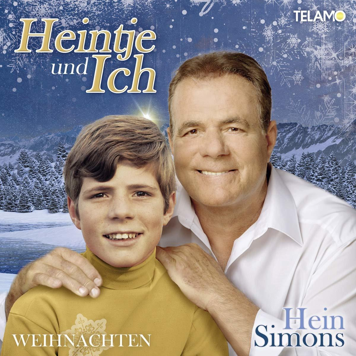 Albumcover mit zwei Personen. Ein Mann und ein Junge lächeln.