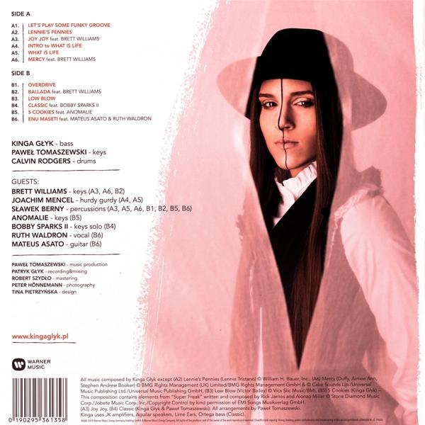 Album-Rückseite mit dem Gesicht einer Frau. Titelliste und Credits sind ebenfalls vorhanden.