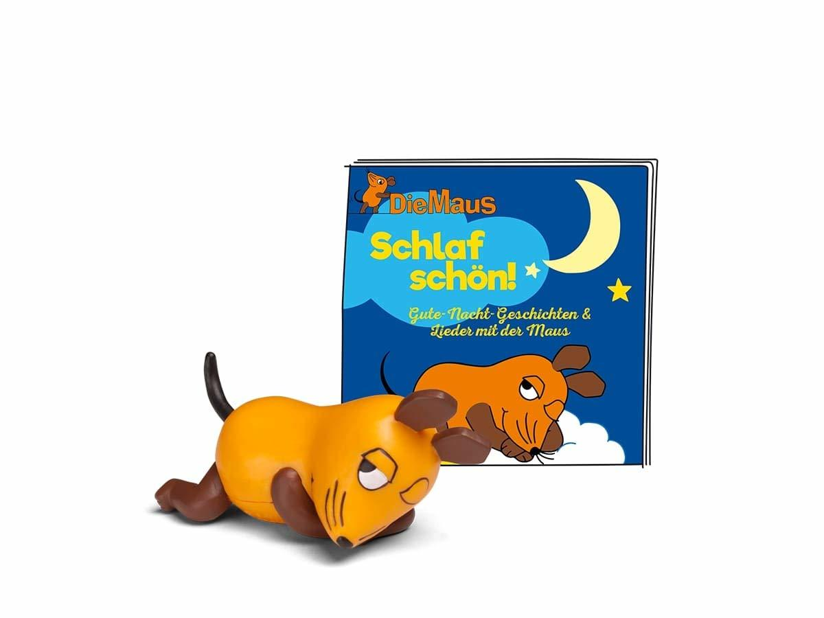 Ein gelbes Cartoon-Hundespielzeug und ein Buch mit blauem Umschlag mit einem Cartoon-Hund.