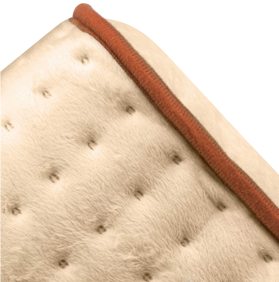 Közelkép egy fehér, steppelt felületről barna szegéllyel.