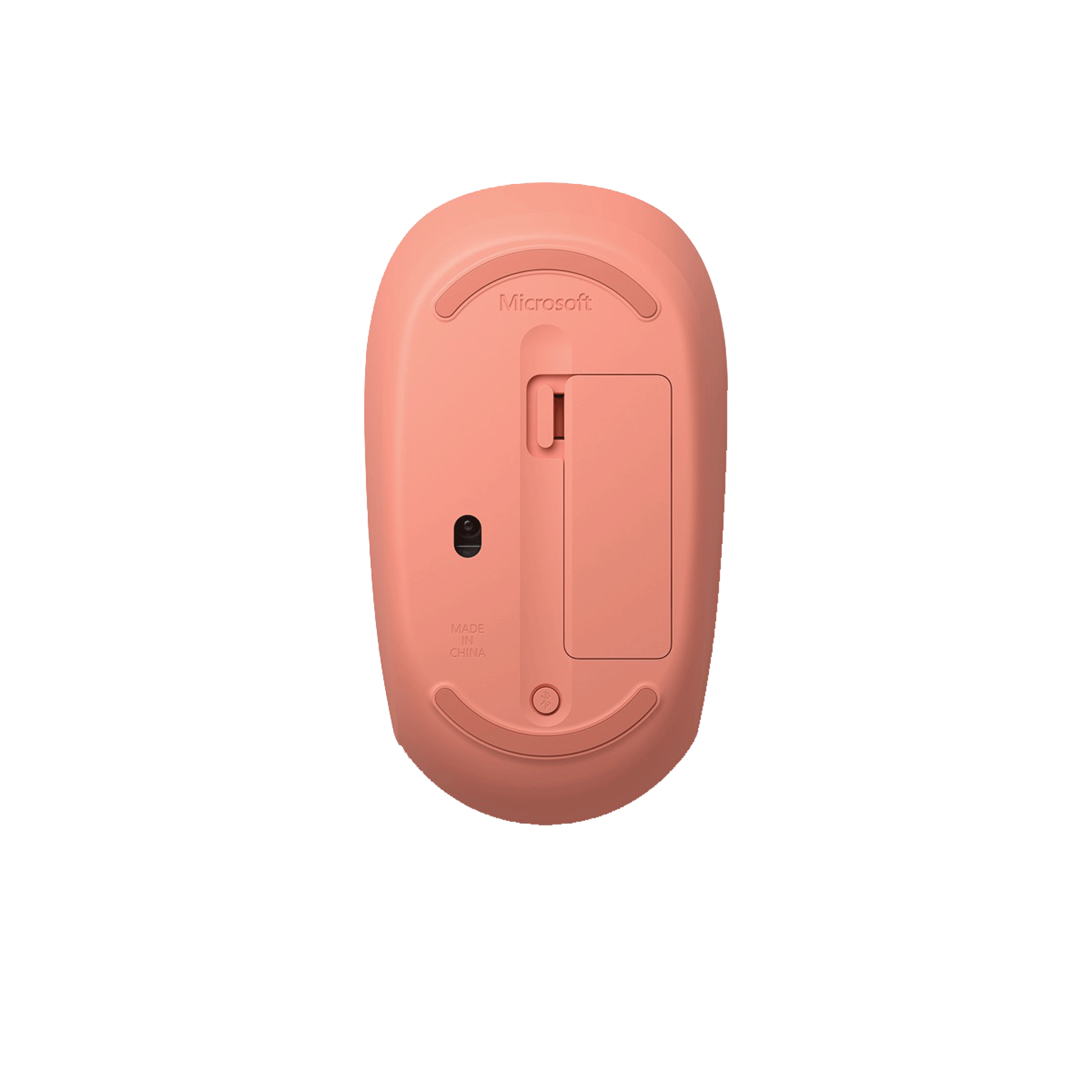 Bottom view of a pink Microsoft mouse, showing battery compartment and 'Made in China'.