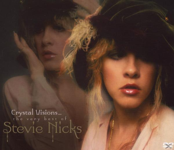 Stevie Nicks Albumcover. Eine Frau mit Hut, rosa Hemd. Text: Crystal Visions, The Very Best of Stevie Nicks.