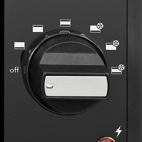 Close-up of a black oven control knob with various cooking symbols and an off setting.