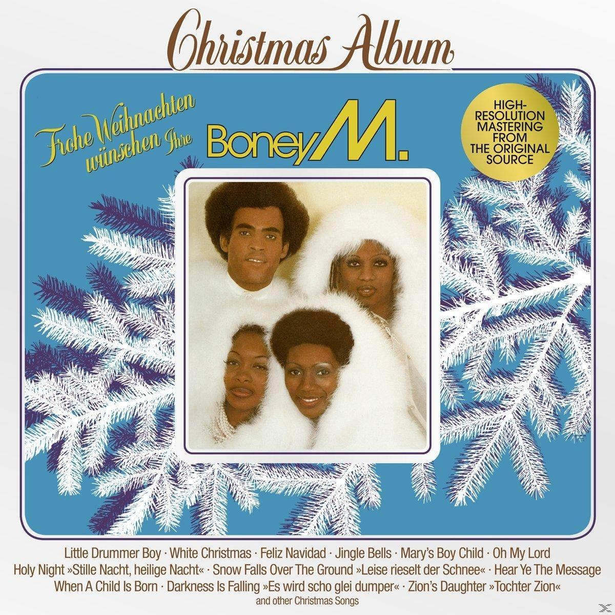 Boney M. karácsonyi album borítója négy emberrel és karácsonyi szöveggel.