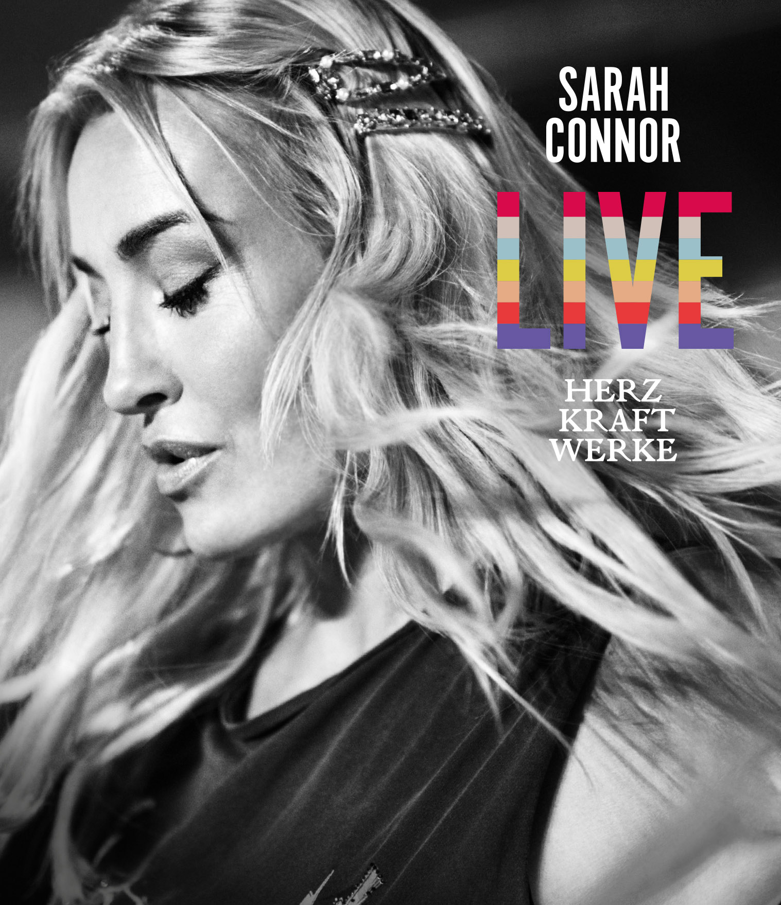 Albumcover mit dem Gesicht von Sarah Connor. Text: Sarah Connor, Live, Herz Kraft Werke. Schwarzweißfoto.