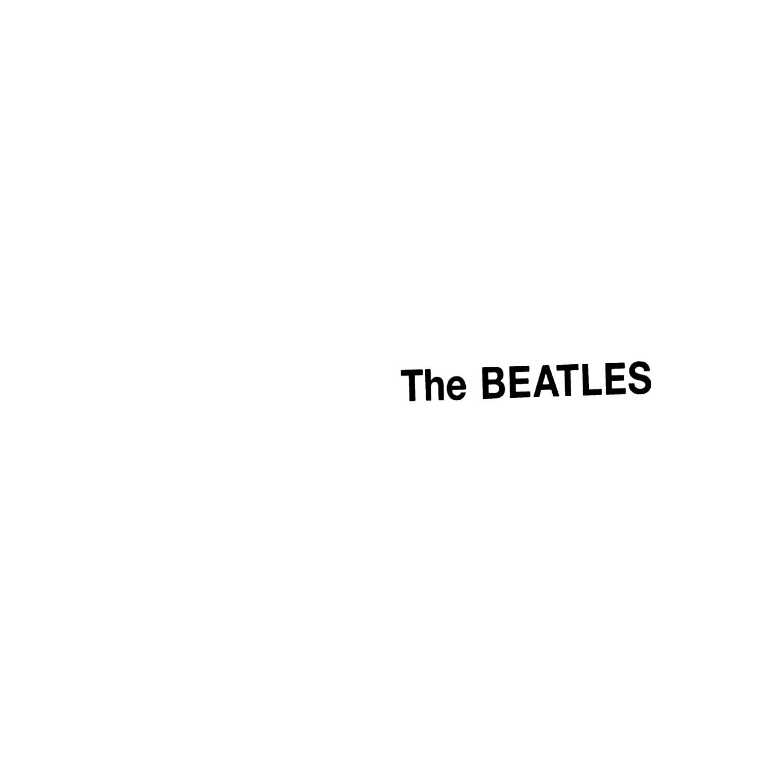 Fehér háttér, fekete 'The BEATLES' felirattal, a kép aljához közel középre igazítva.