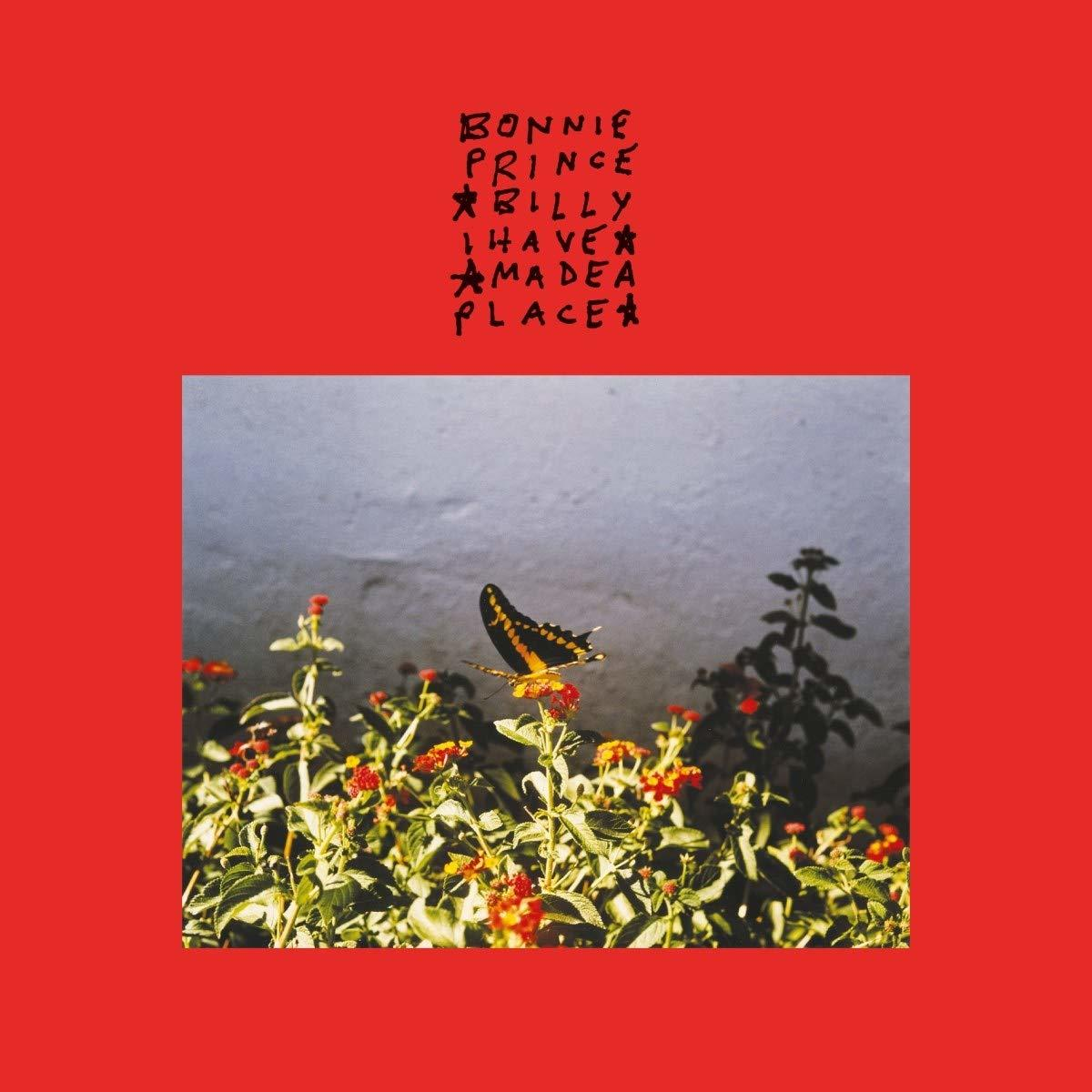 Pochette d'album : Papillon sur une fleur. Texte : Bonnie Prince Billy, I Have Made a Place, fond rouge.