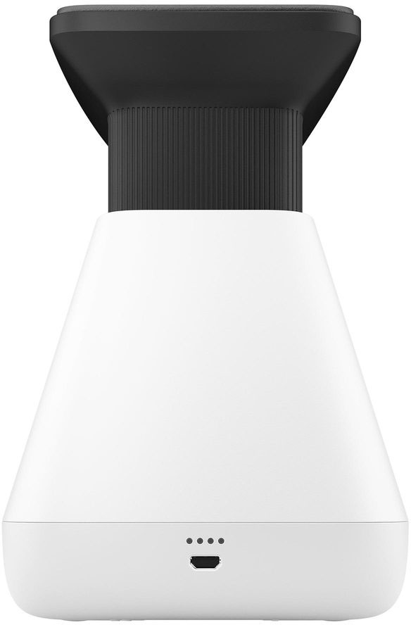 Een wit-zwarte lamp met een conische vorm en vier punten aan de onderkant.