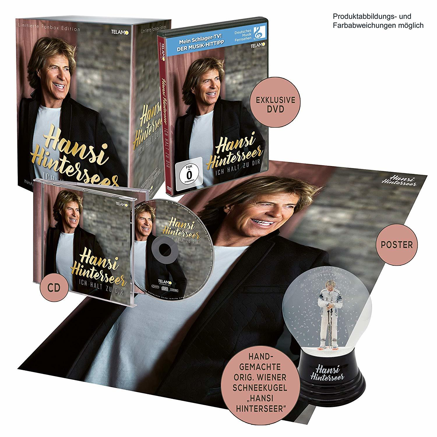 Hansi Hinterseer Album- und DVD-Set mit Schneekugel, Poster und anderen Werbematerialien.