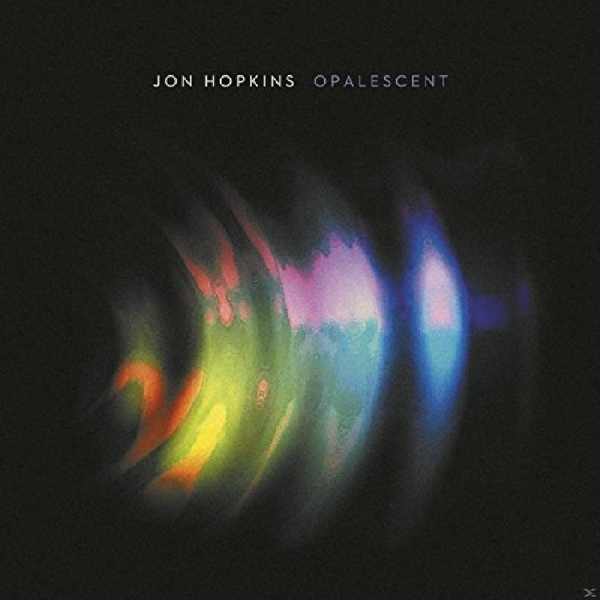 Album borítója egy elmosódott, színes fényörvénnyel. A szöveg: 'Jon Hopkins Opalescent'.