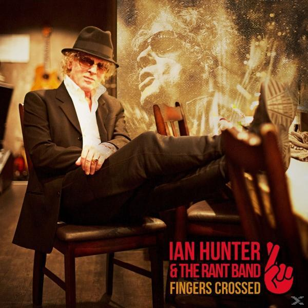 Ian Hunter albumborító. Férfi öltönyben, kalapban, lábak keresztezve, ülve. 'Ian Hunter & the Rant Band' szöveg.