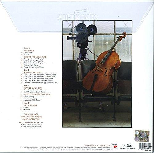 Album borító egy csellóval, filmkamerával és székekkel. Fekete, barna és fehér színvilág.