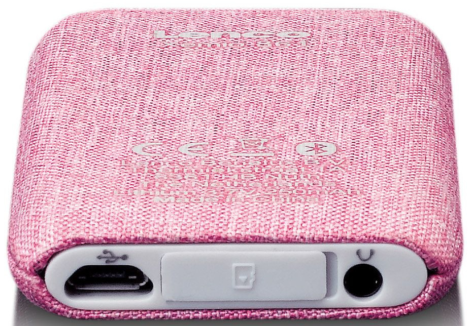 Pink, rectangular portable music player with ports, a charging port, and other details.