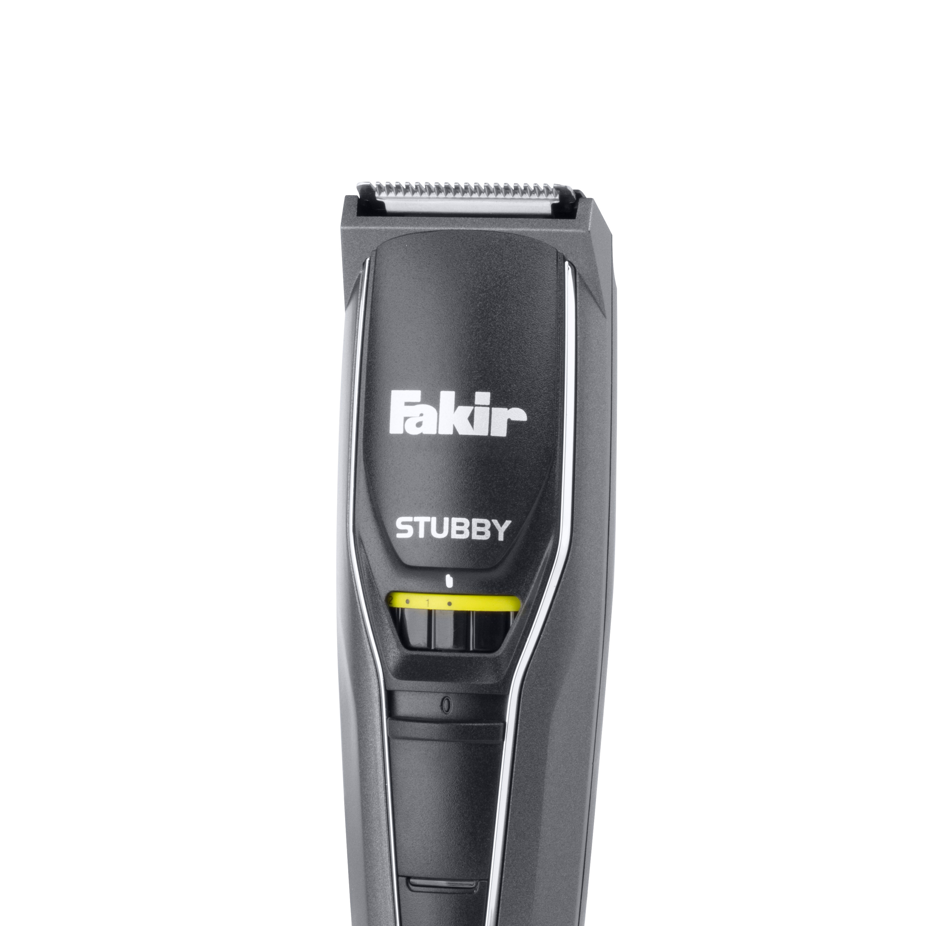 Schwarzer und grauer Fakir Stubby Trimmer. Gelbes Zifferblatt mit Zahlen und Markenname Fakir.