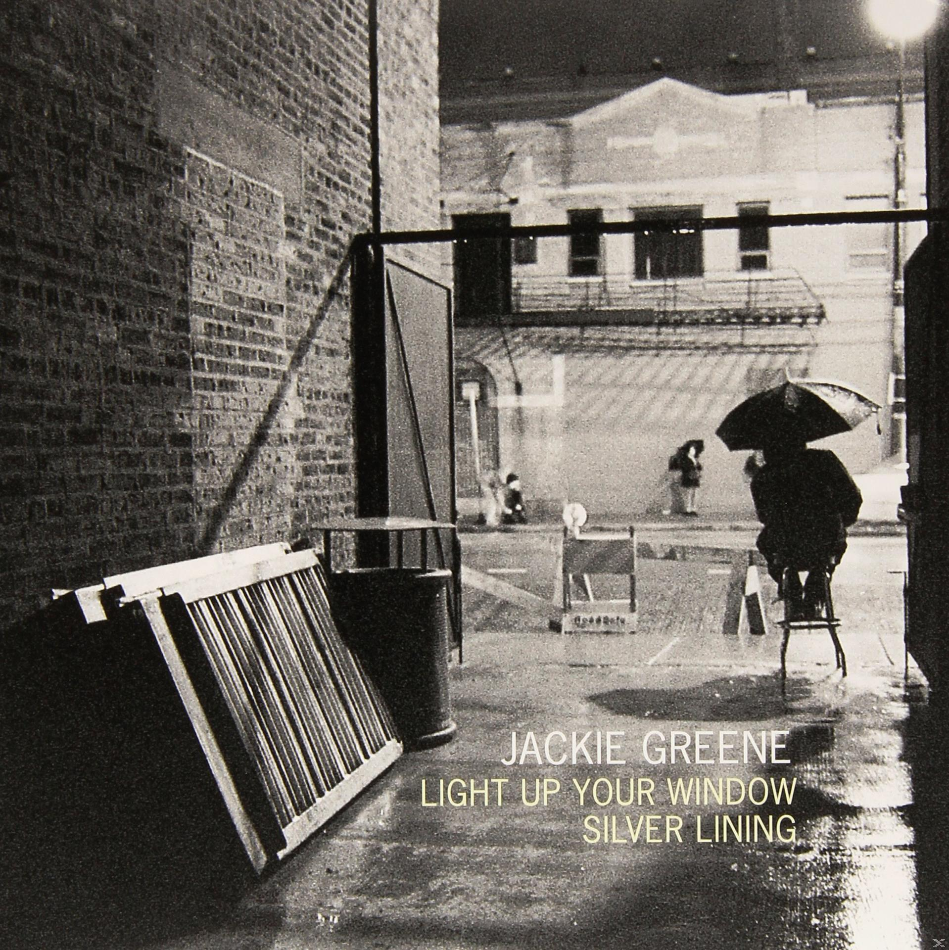 Schwarzweiß-Albumcover: Straßenszene bei Nacht, mit Text: Jackie Greene.