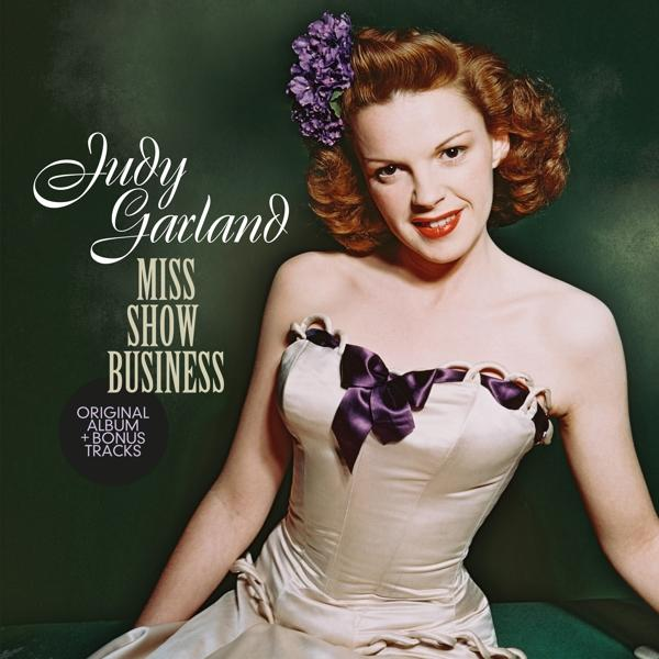 Albumcover von Judy Garland, die ein weißes Kleid mit einer lila Blume im Haar trägt.