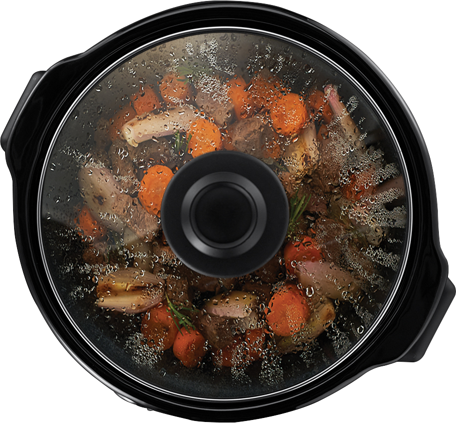 Black slow cooker with a glass lid. The pot contains cooked food, carrots, and meat.
