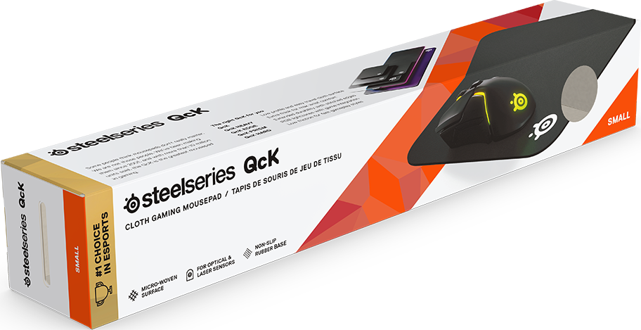 Un tapis de souris de jeu en boîte de steelseries qck, avec une souris de jeu et une boîte dessus.