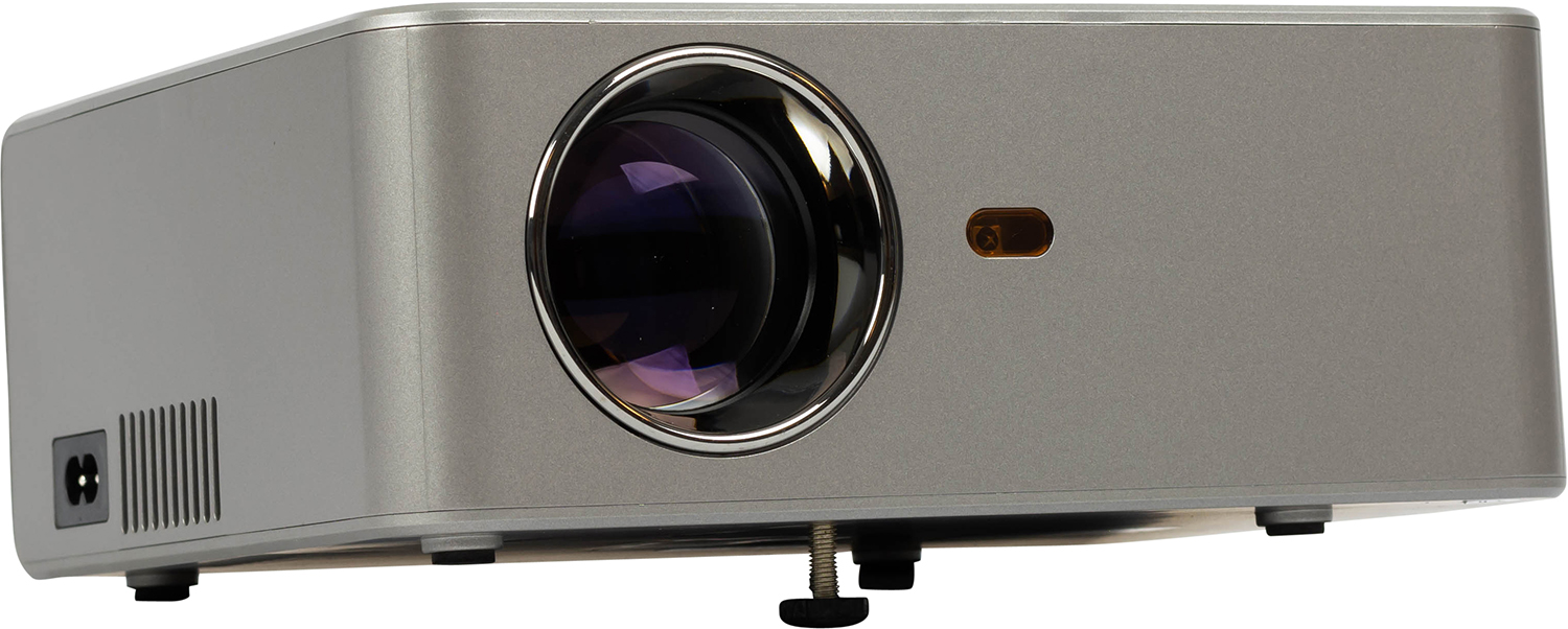 A silver projector with a large lens on the front, a power port, and an orange light.