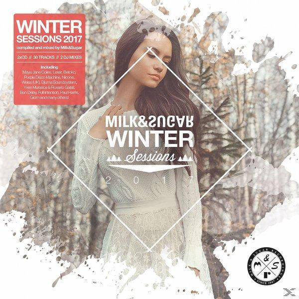 Albumcover mit einer Frau in weißem Kleid in winterlicher Waldkulisse.