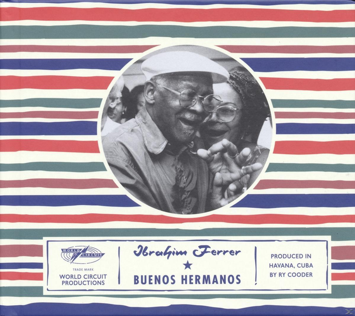 Albumcover: Ibrahim Ferrer. Lachende man en vrouw in een cirkel, met tekst op een gestreepte achtergrond.