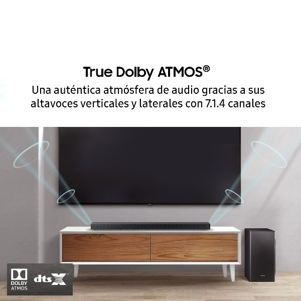 Configuración de cine en casa con TV, barra de sonido y subwoofer.