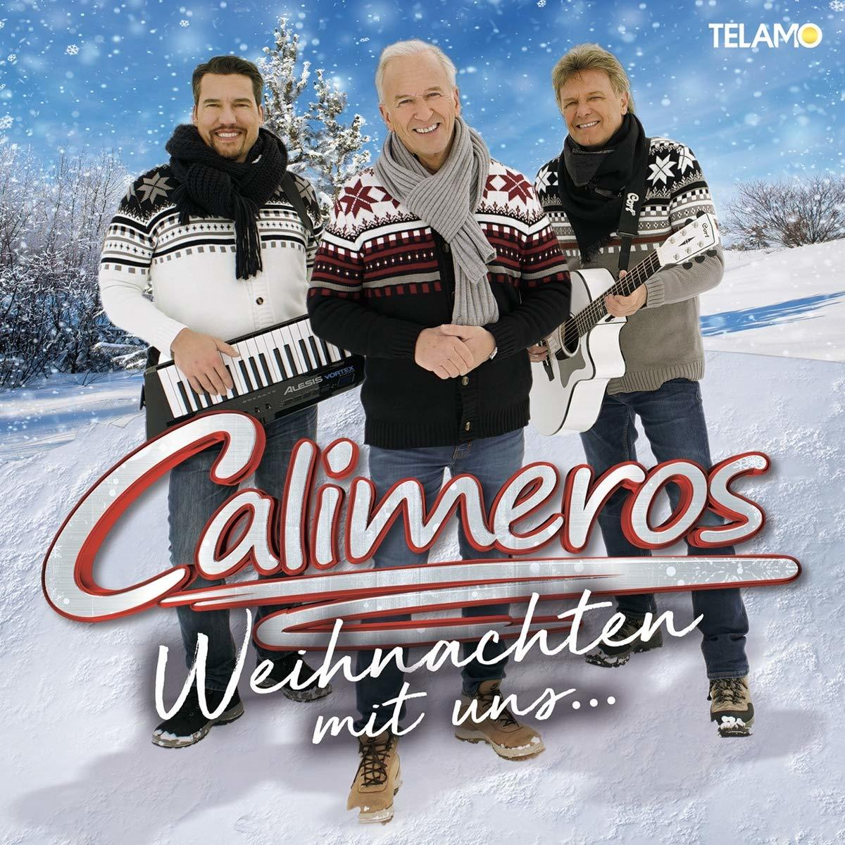 Albumcover mit drei Männern mit Musikinstrumenten in Winterkleidung. Text: 'Calimeros Weihnachten mit uns...'