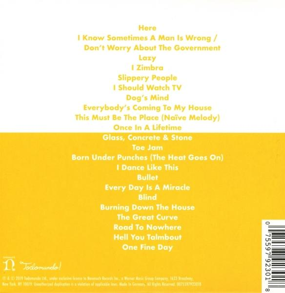Rückseite des Albums mit Songtiteln in weißem Text auf gelbem Hintergrund.