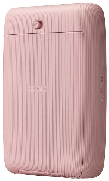Una impresora Fujifilm Instax Mini Link rosa. El dispositivo tiene una superficie texturizada y un pequeño botón.