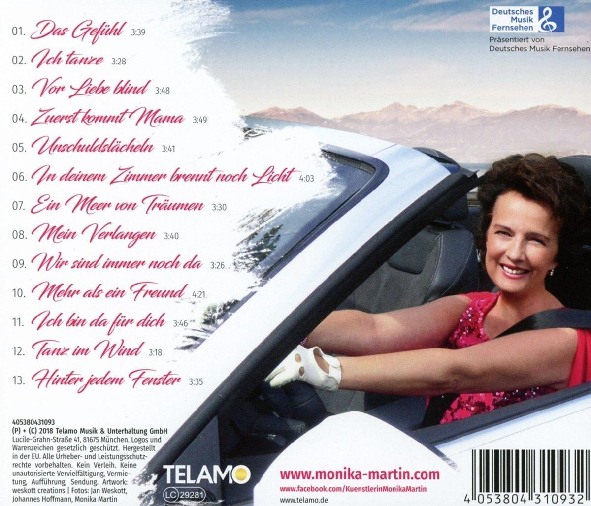 CD-Rückseite mit Titelliste und Himmelskörper-Grafik.
