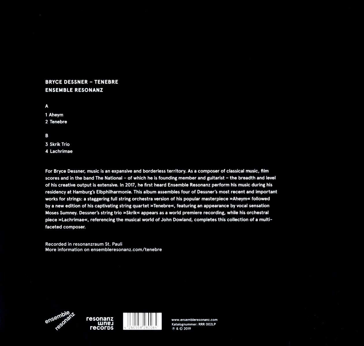 Dos de l'album avec texte et logos. Le fond est de couleur gris clair.