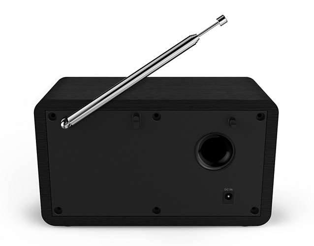 Schwarzes Holzradio mit einer silbernen Antenne. Die Rückseite zeigt einen Lautsprecher und einen DC-Eingang.