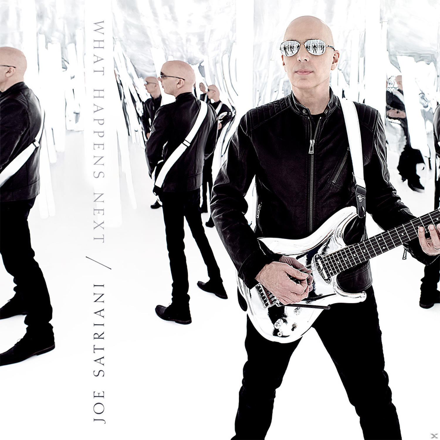 Joe Satriani album borítója. Kopasz férfi ezüst gitáron játszik, tükrözött háttérrel és fekete ruhában.