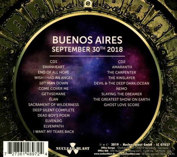 Pochette arrière d'album CD avec liste des titres et informations sur l'artiste sur un fond étoilé.