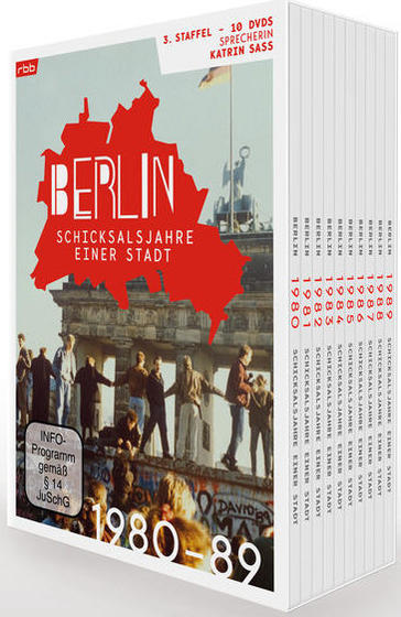 DVD-Box-Set mit mehreren angeordneten Hüllen. Text auf der Vorderseite, mit Stadtszene.