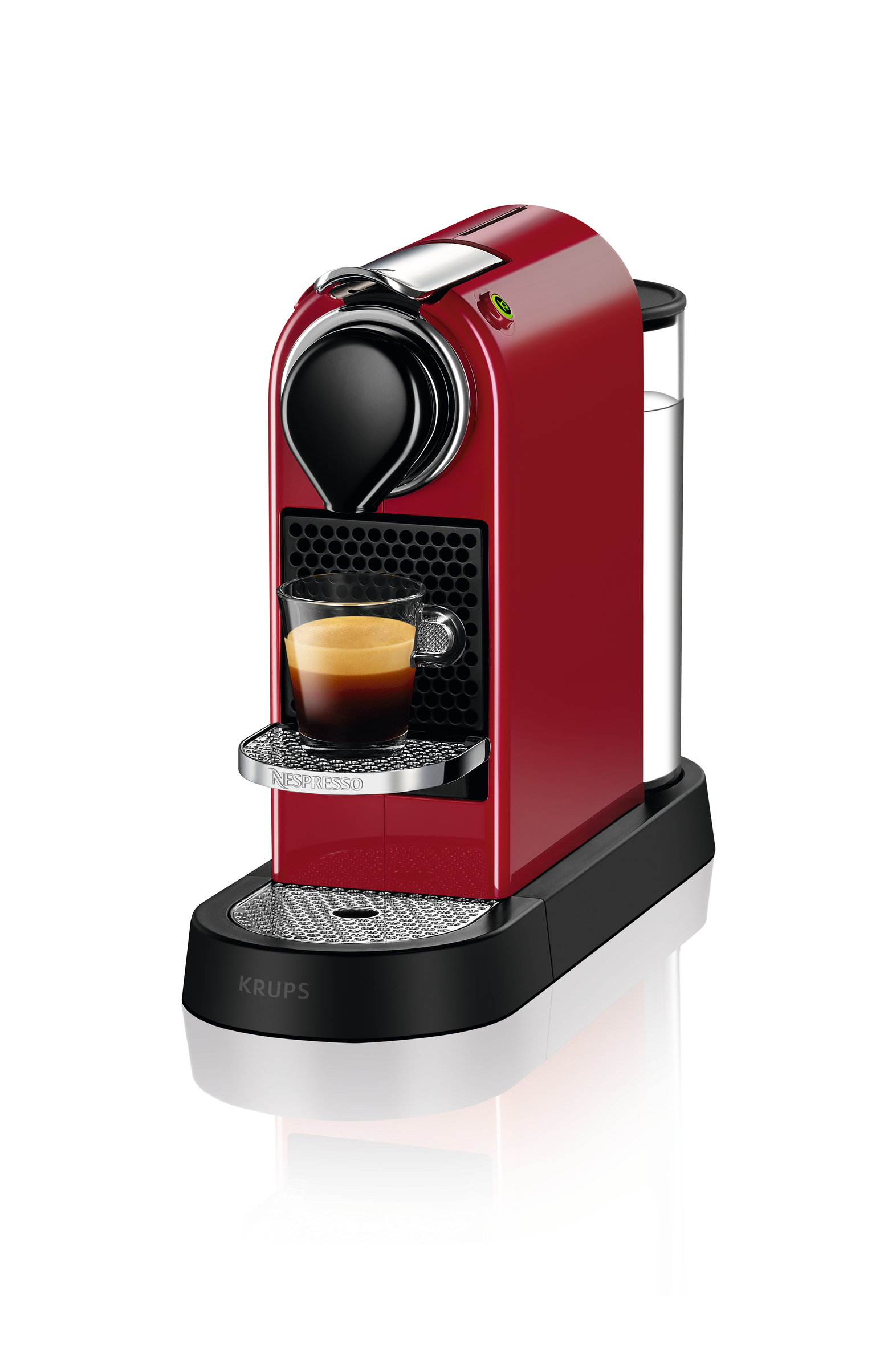 Cafetera Nespresso roja con un vaso de café y una base negra.