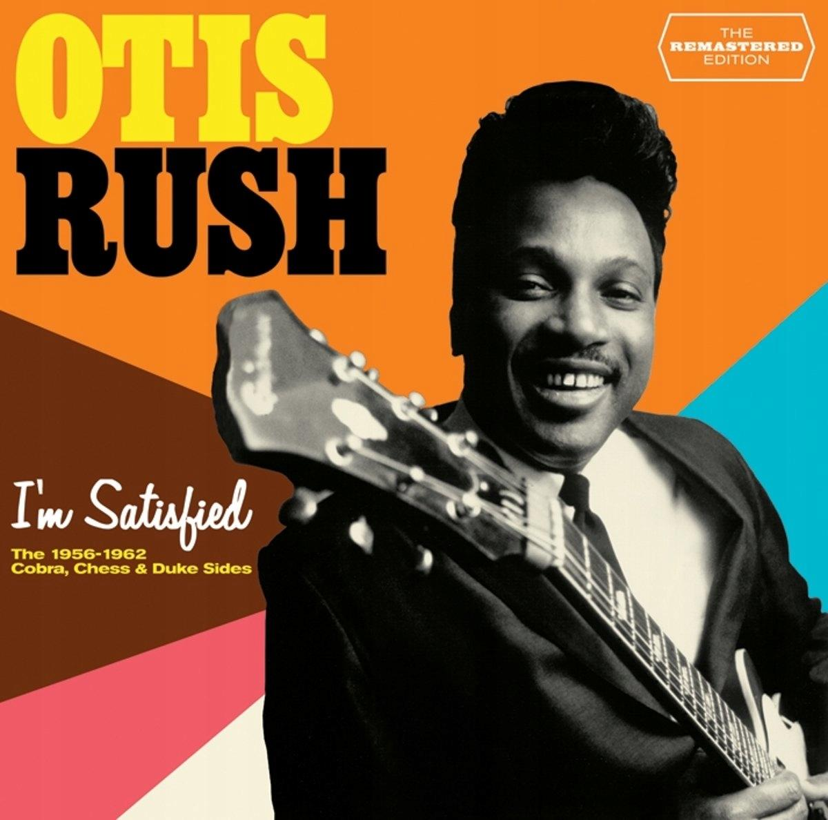 Otis Rush album borítója. Férfi öltönyben gitárral. Narancssárga és kék háttér.