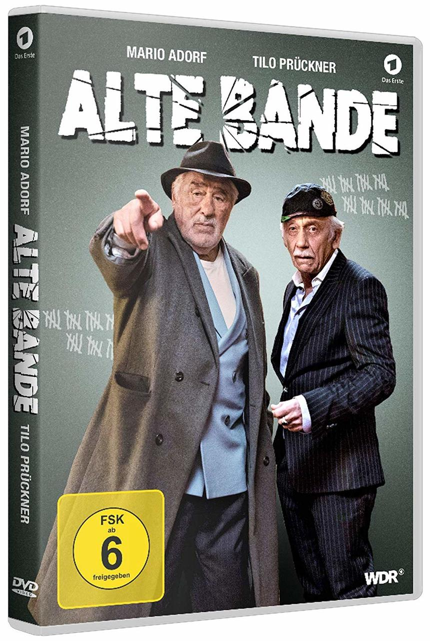 DVD-Hülle mit zwei Männern vor grünem Hintergrund, mit Text.