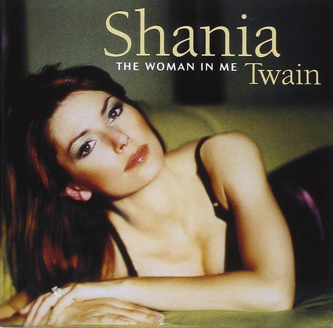 Shania Twain album borítója. Fekete felsőt visel, szexi pillantással pózol.
