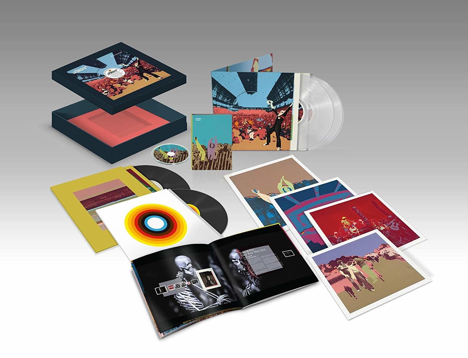 Een boxset met diverse media: dvd's, vinylplaten, boekjes en kunstdrukken. De set bevat een doos, doorzichtige vinyls en een boekje.