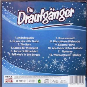 CD-Cover mit deutschem Text, Schneeflocken und blauem Hintergrund. Es listet Songs und einen Bandnamen.