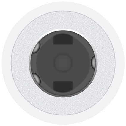 Egy fehér audio jack közeli képe, sötét belsővel és fémes felülettel.