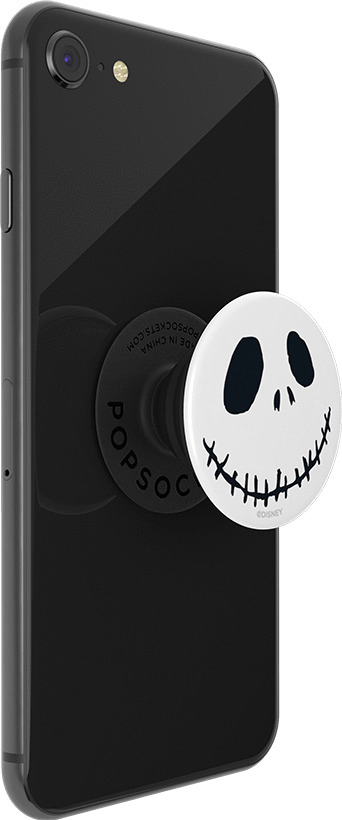 Ein schwarzes Telefon mit einem befestigten Jack Skellington PopSocket, das das Gesicht der Figur zeigt.