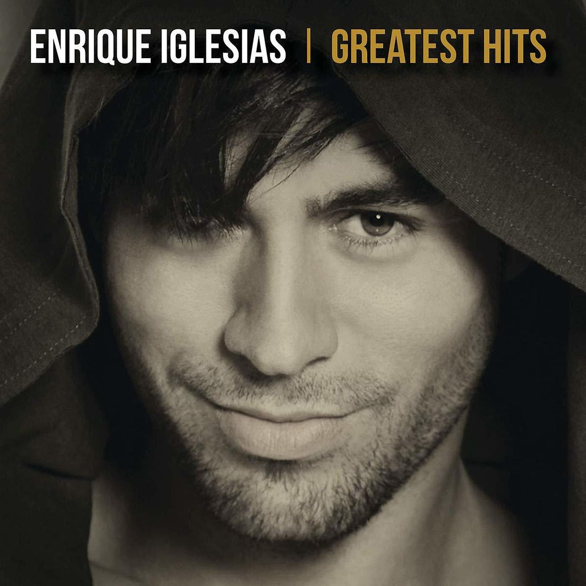 Het gezicht van Enrique Iglesias op de albumhoes. Tekst: 'Enrique Iglesias' en 'Greatest Hits'.